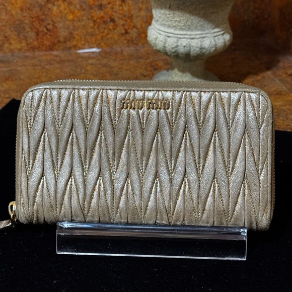 Miu Miu Handbags - Miu Miu Gold Matelassé Nappa Leather Wallet